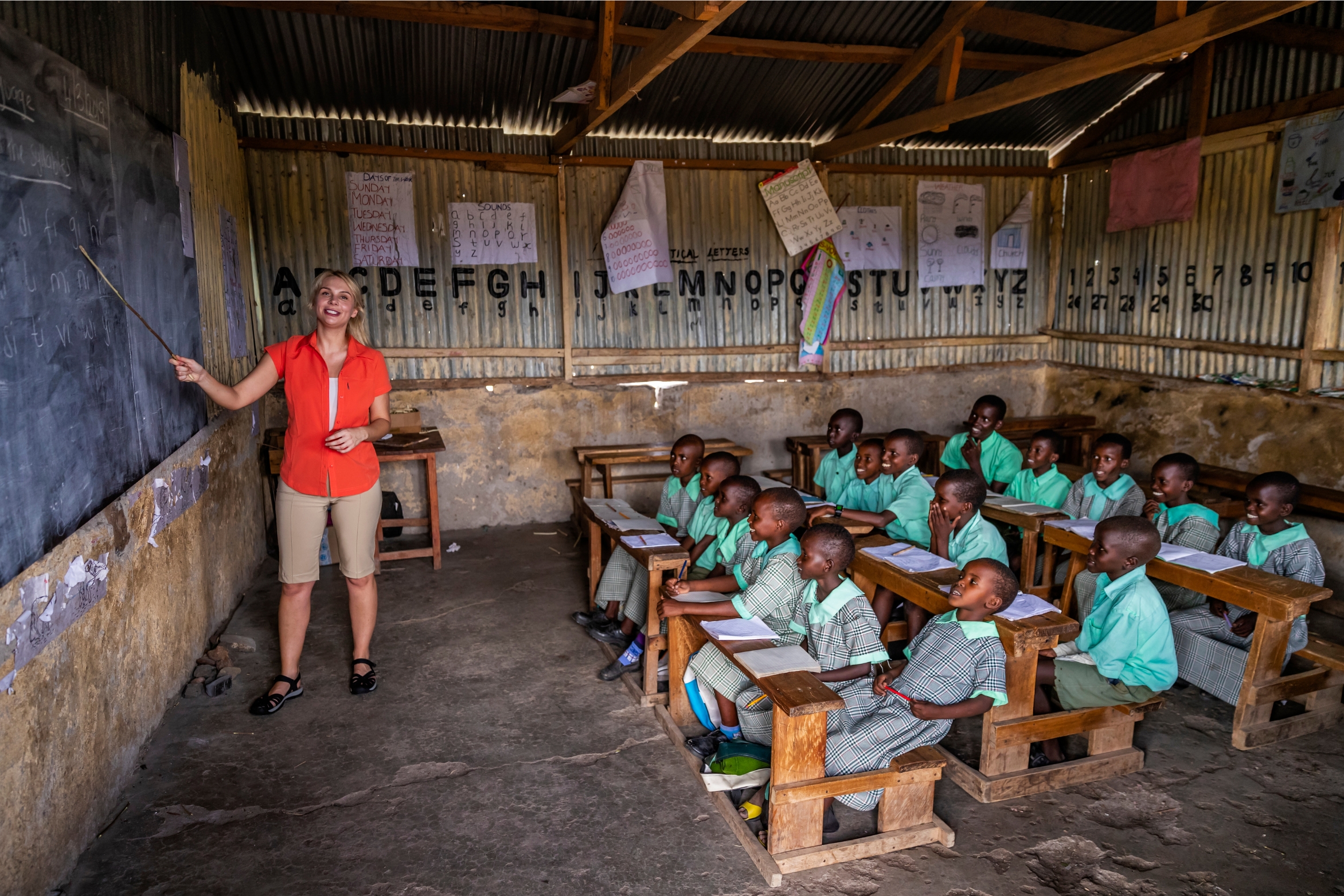 Volunteer teaching in school in Kenya