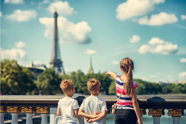 Children gazing at Eiffel Tower